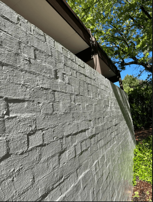 Restored brick wall and eave detail